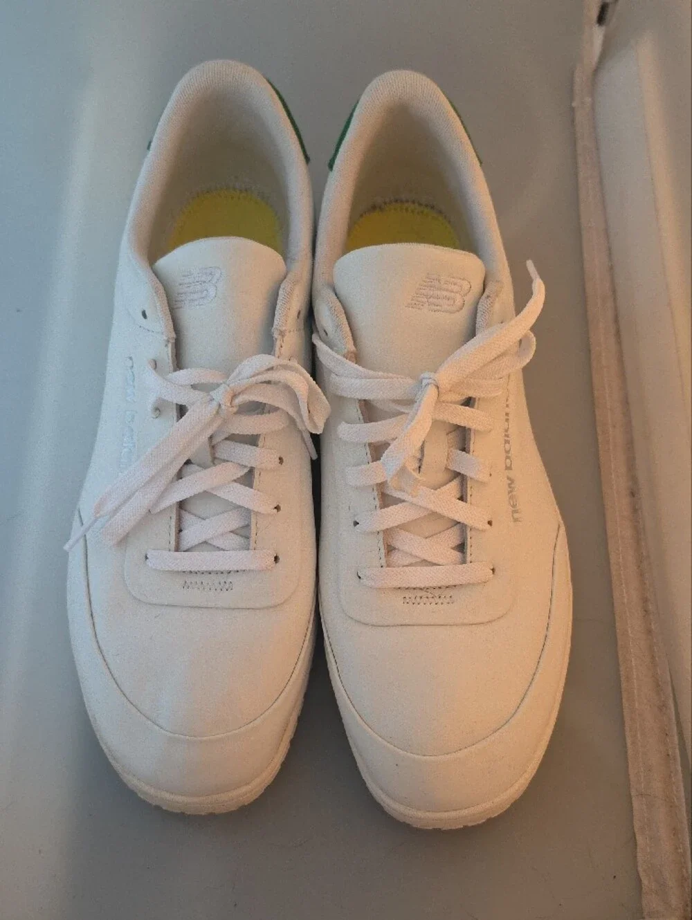 New Balance White Sneakers with Green Heel Accent